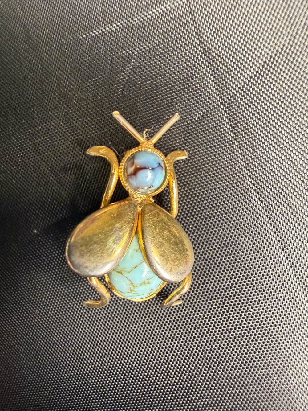 Vintage fly pin with turquoise stones